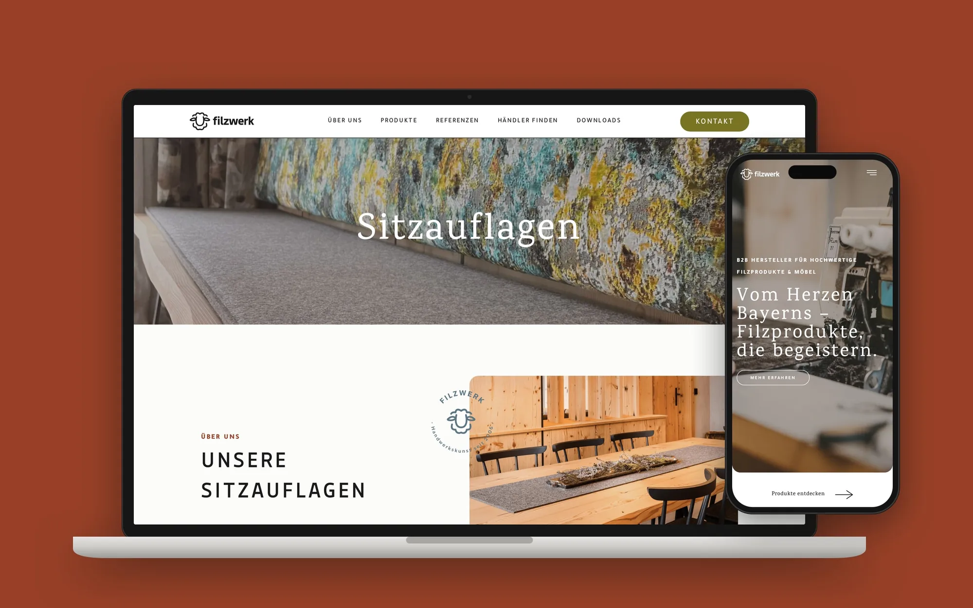 Laptop mit der Filzwerk-Seite zu Sitzauflagen und Smartphone mit der mobilen Startseite