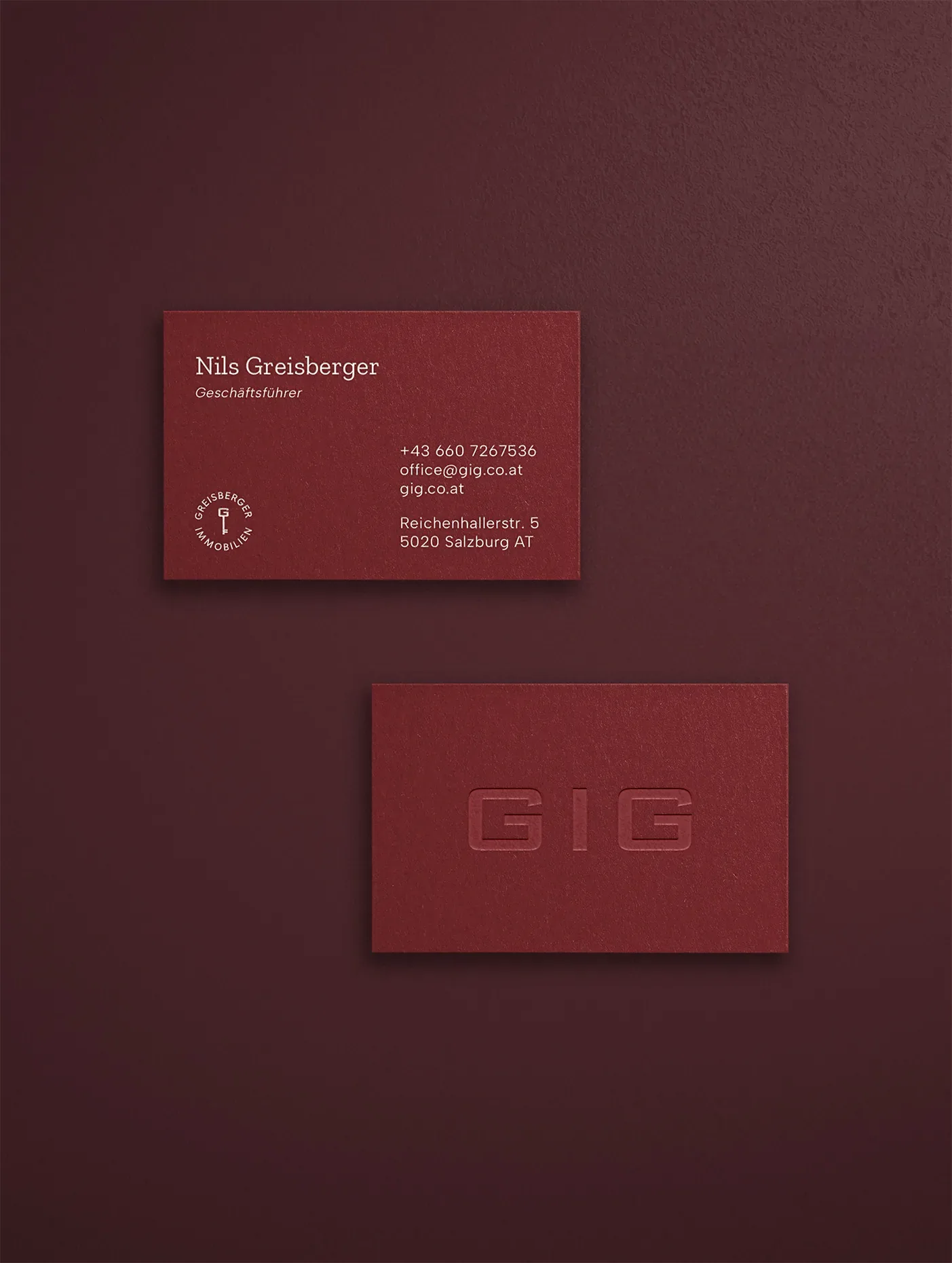 Visitenkarte von Nils Greisberger in Bordeaux mit geprägtem GIG-Logo